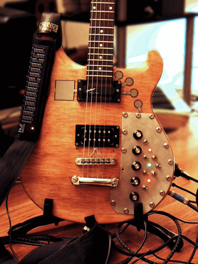 A customized electric guitar was used to sample GuitarMachine.